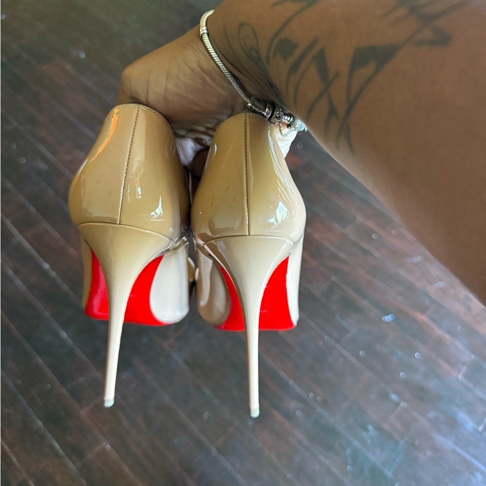 Christian Louboutin Tan Red Heels